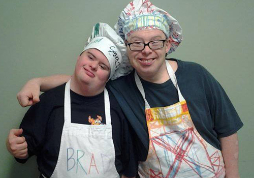 client-chefs Two chefs smiling